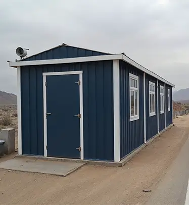 Porta Cabin at an Indian construction site with red bricks and cement bags.