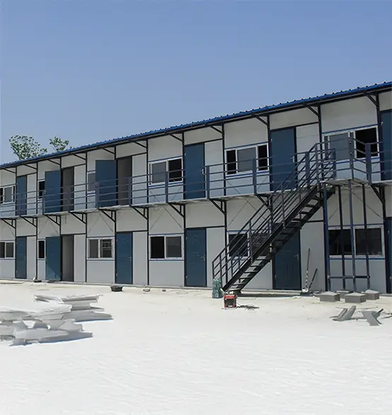 Porta Cabin under bright midday sun at an Indian construction site.